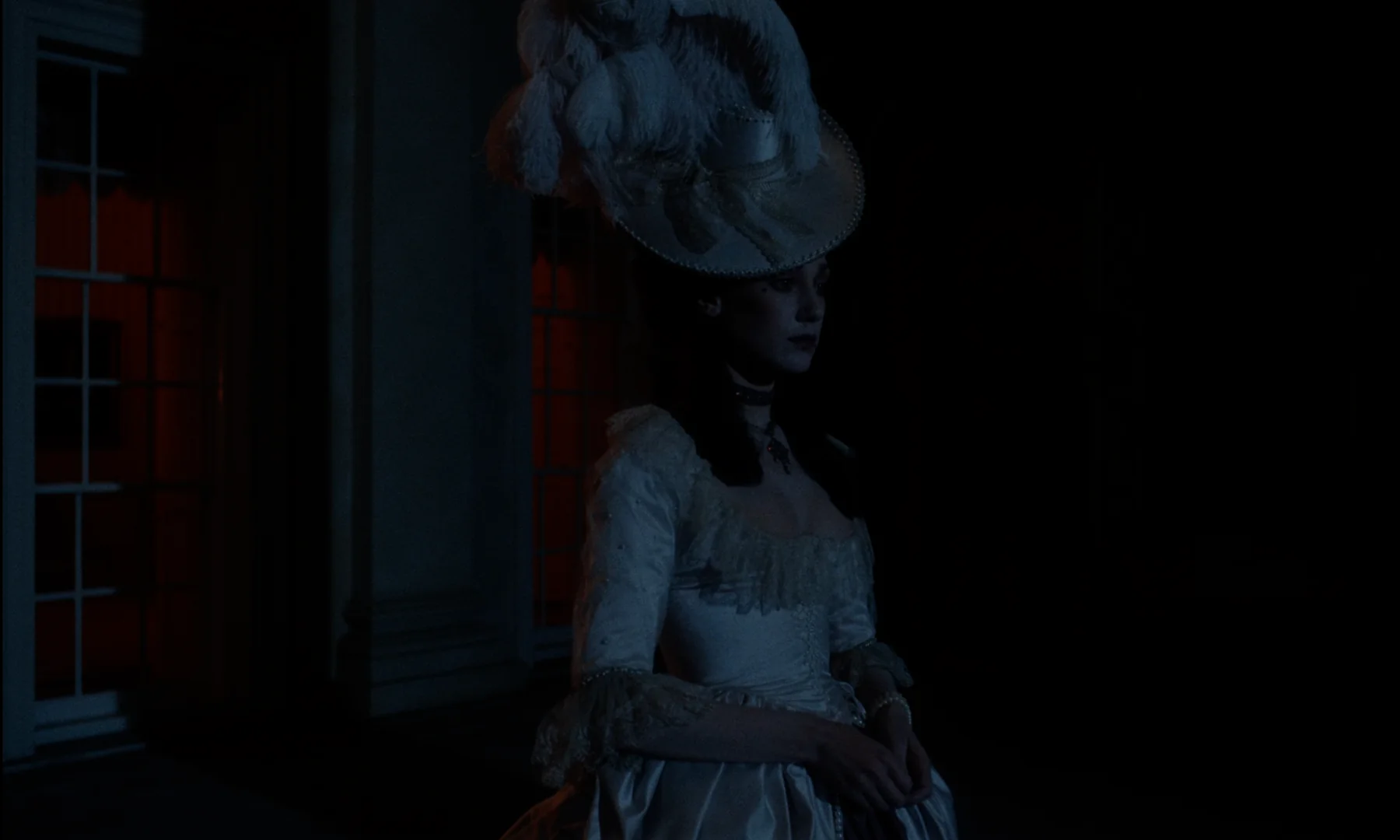 Barry Lyndon (1975) — a period figure held in low warm light against near-darkness