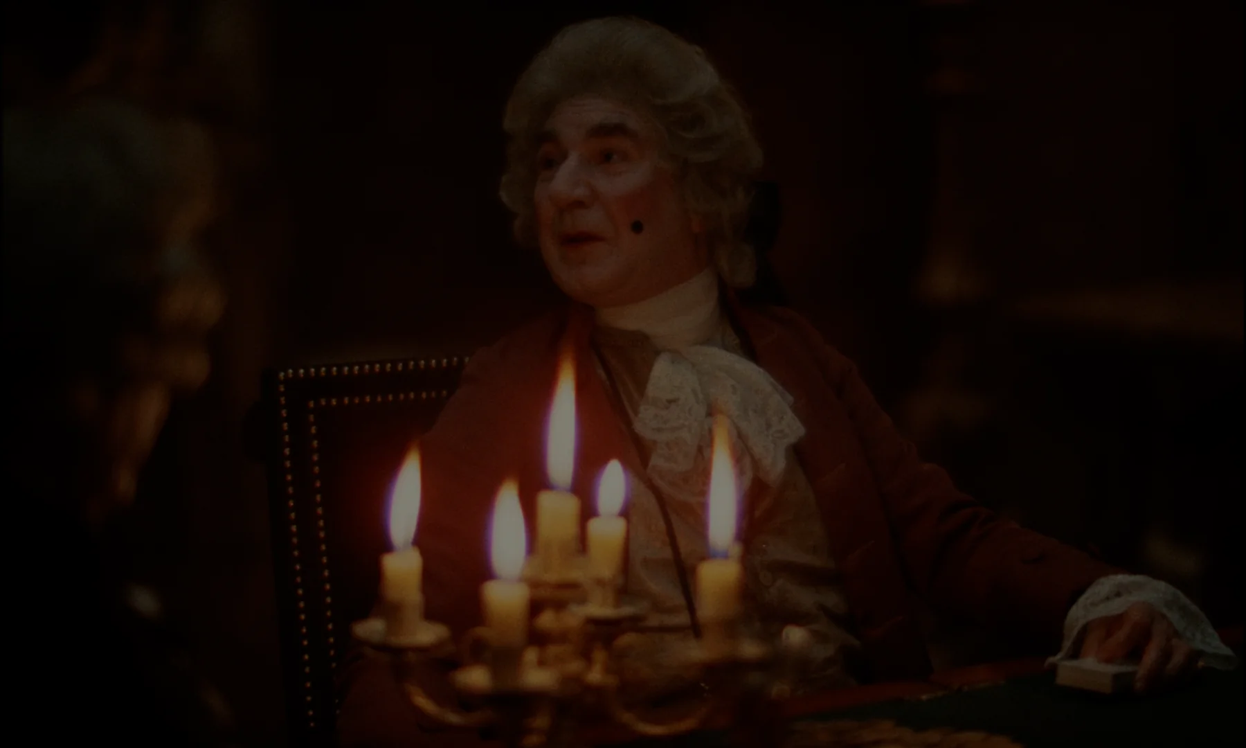 Kubrick's Barry Lyndon (1975) shot its interiors by candle flame — the tradition Mathon works inside
