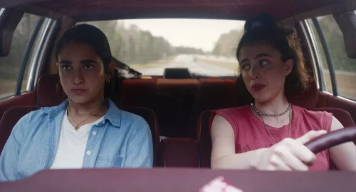 Still frame 67 from Drive-Away Dolls (2024) directed by Ethan Coen