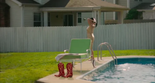 Still frame 102 from Drive-Away Dolls (2024) directed by Ethan Coen