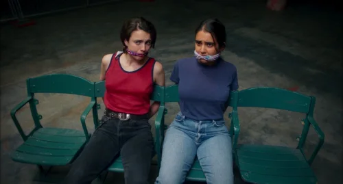 Still frame 110 from Drive-Away Dolls (2024) directed by Ethan Coen