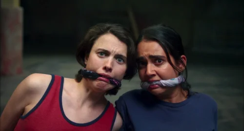 Still frame 115 from Drive-Away Dolls (2024) directed by Ethan Coen
