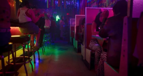 Still frame 127 from Drive-Away Dolls (2024) directed by Ethan Coen