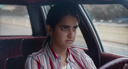 Still frame 27 from Drive-Away Dolls (2024) directed by Ethan Coen