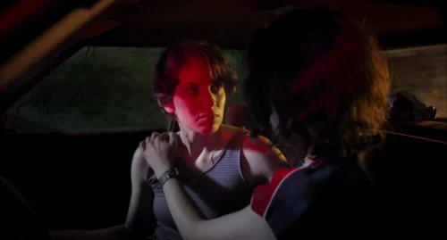 Still frame 54 from Drive-Away Dolls (2024) directed by Ethan Coen