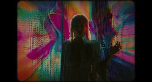 Still frame 62 from Drive-Away Dolls (2024) directed by Ethan Coen