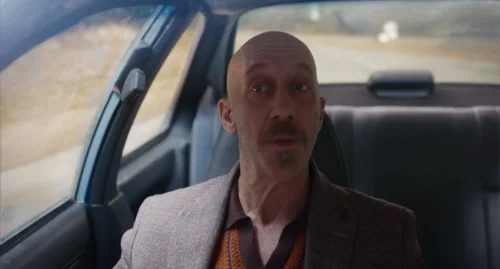 Still frame 63 from Drive-Away Dolls (2024) directed by Ethan Coen