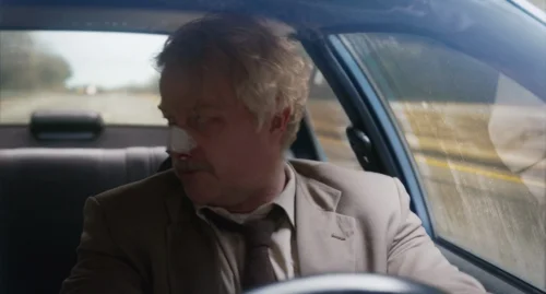 Still frame 64 from Drive-Away Dolls (2024) directed by Ethan Coen