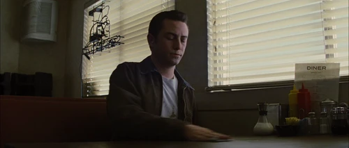 Still frame 6 from Looper (2012) directed by Rian Johnson
