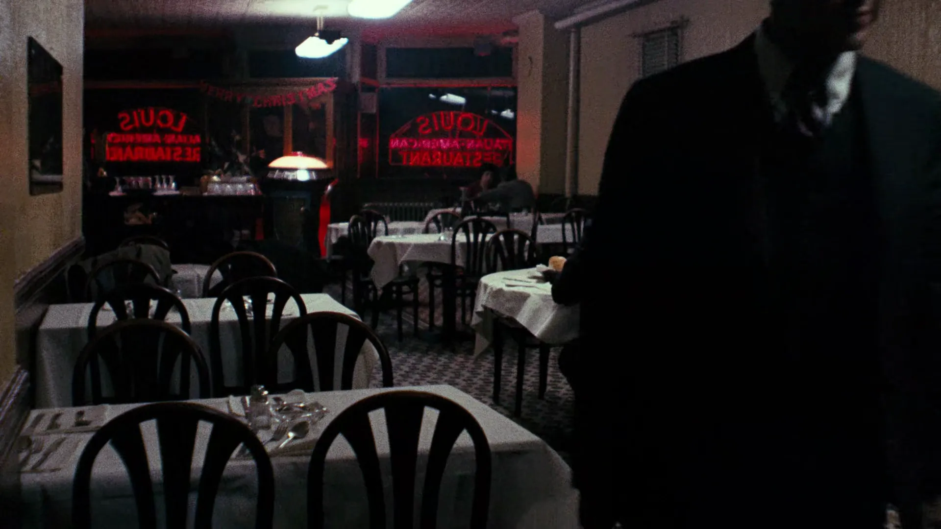 The Godfather (1972), DP Gordon Willis — a figure in near-total shadow, the room falling to black