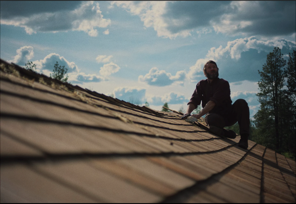 Still frame 215 from Train Dreams (2025) directed by Clint Bentley