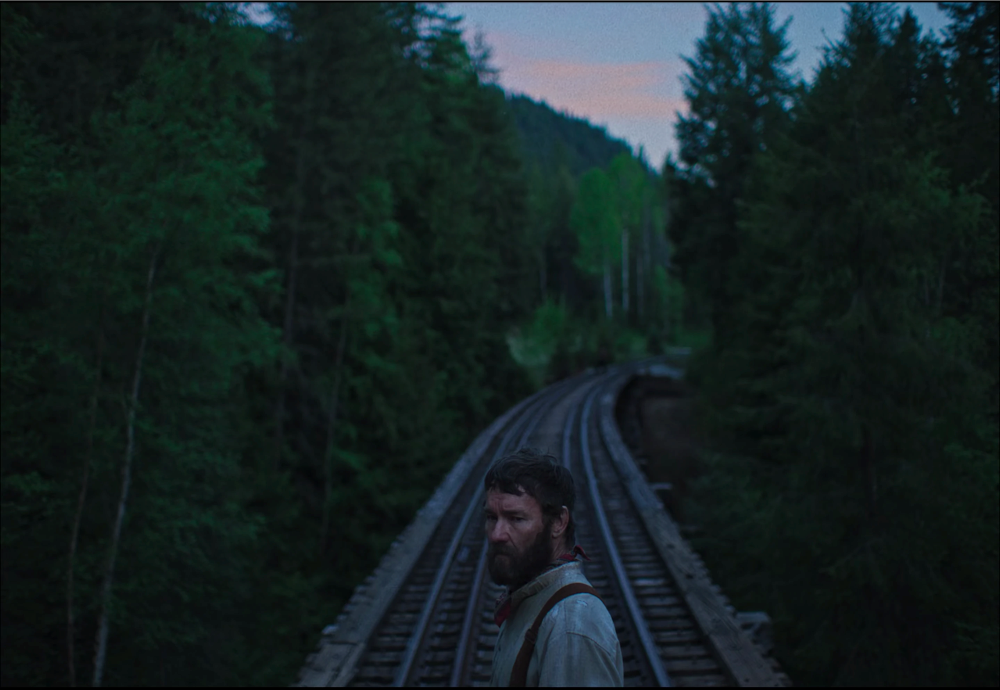 Still frame 27 from Train Dreams (2025) directed by Clint Bentley
