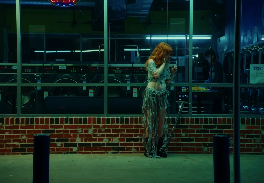 Still frame 3 from Die Spitz - Throw Yourself to the Sword (2025) directed by Emily Sanchez