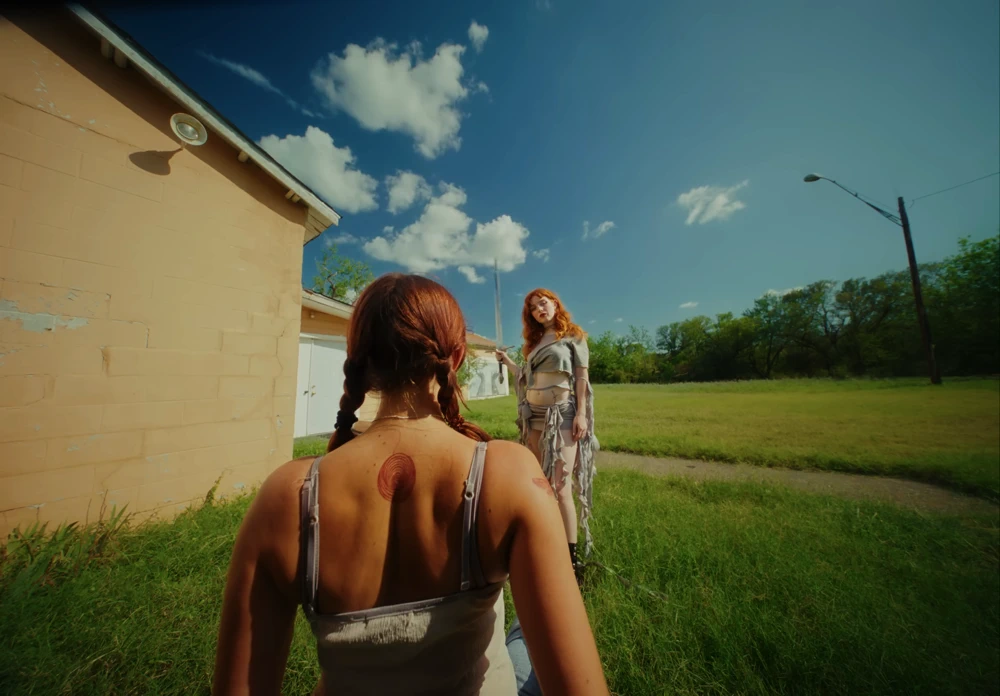 Still frame 8 from Die Spitz - Throw Yourself to the Sword (2025) directed by Emily Sanchez