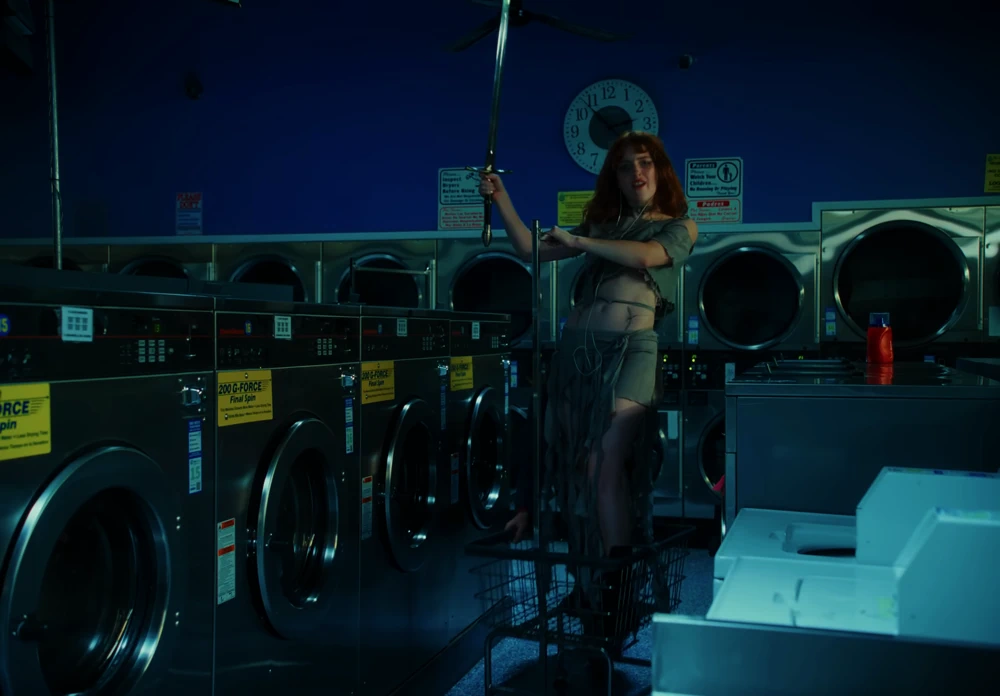 Still frame 11 from Die Spitz - Throw Yourself to the Sword (2025) directed by Emily Sanchez