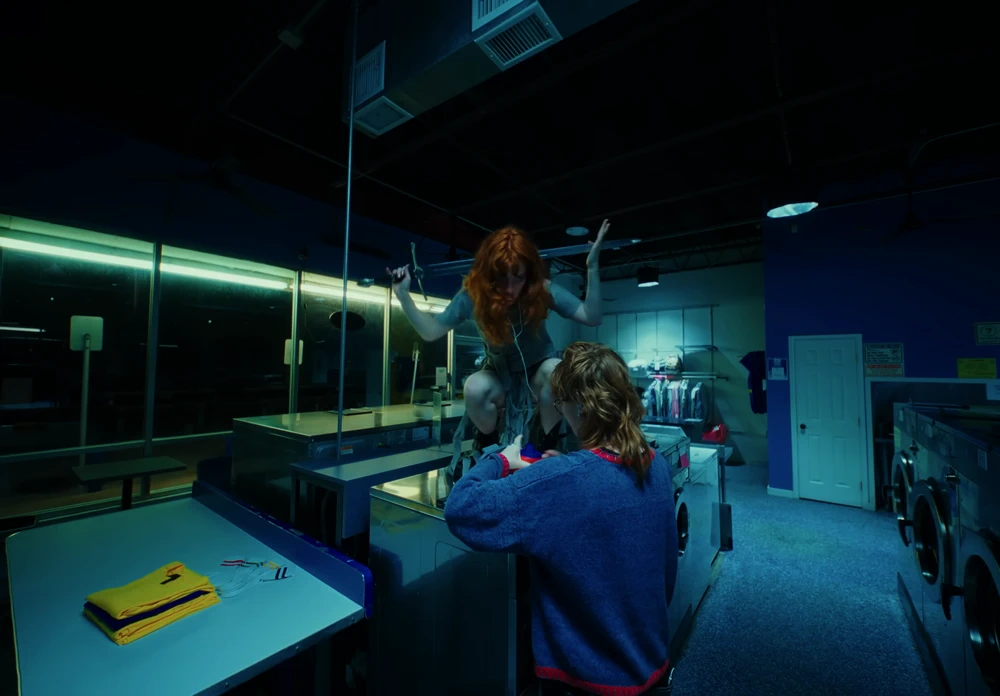 Still frame 12 from Die Spitz - Throw Yourself to the Sword (2025) directed by Emily Sanchez