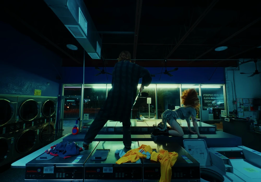 Still frame 26 from Die Spitz - Throw Yourself to the Sword (2025) directed by Emily Sanchez