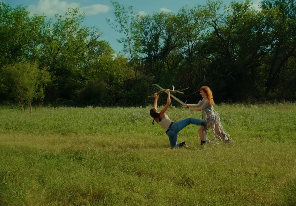 Still frame 31 from Die Spitz - Throw Yourself to the Sword (2025) directed by Emily Sanchez