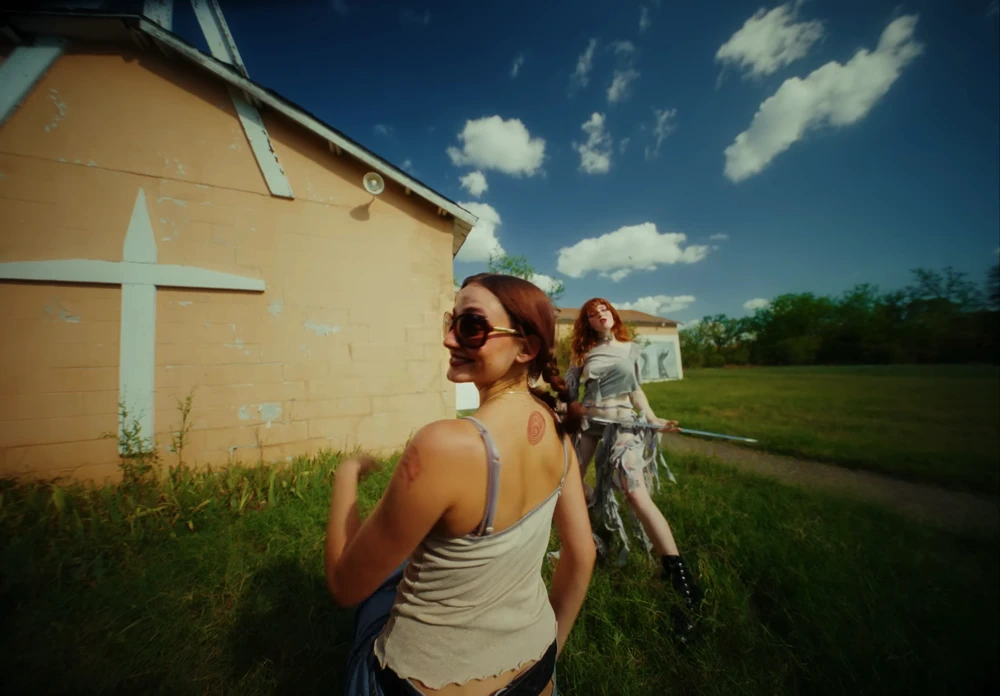 Still frame 35 from Die Spitz - Throw Yourself to the Sword (2025) directed by Emily Sanchez