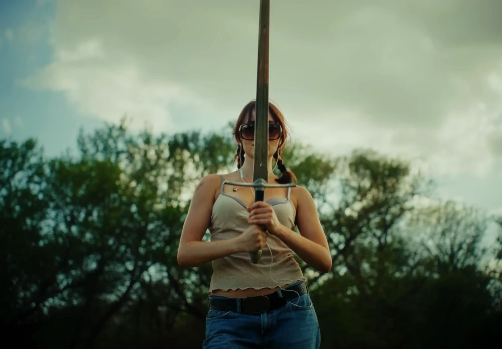 Still frame 36 from Die Spitz - Throw Yourself to the Sword (2025) directed by Emily Sanchez