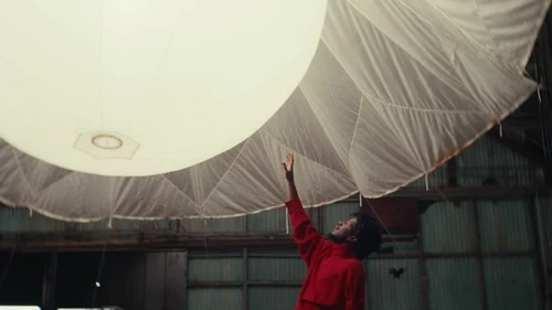 Still frame 10 from Labrinth - S.W.M.F. (2025) directed by Brendan Walter