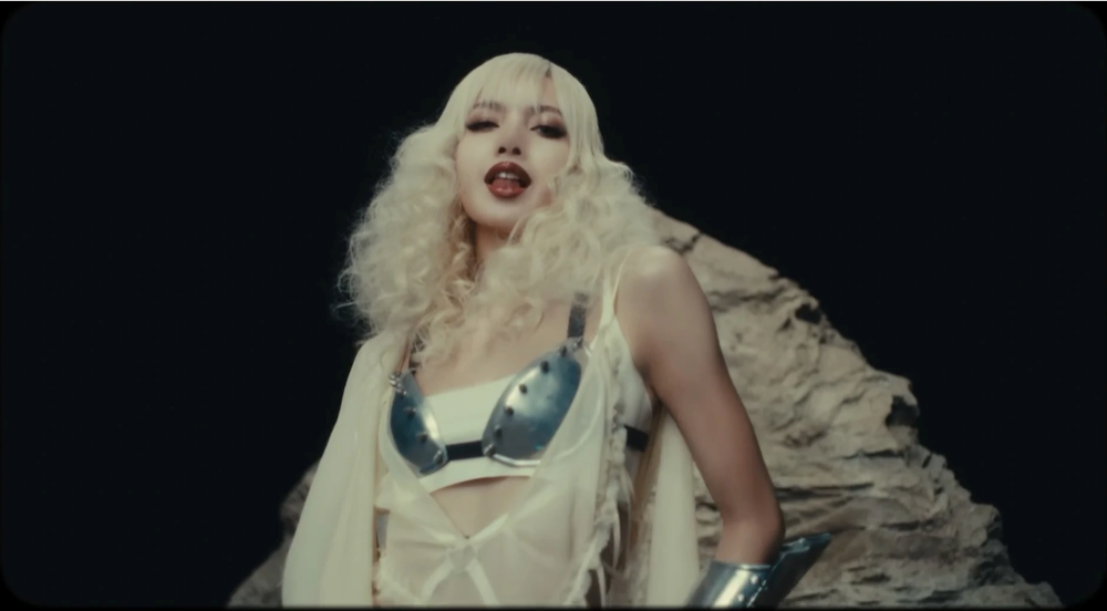 Still frame 54 from LISA - BORN AGAIN feat. Doja Cat & RAYE (2025) directed by Bardia Zeinali