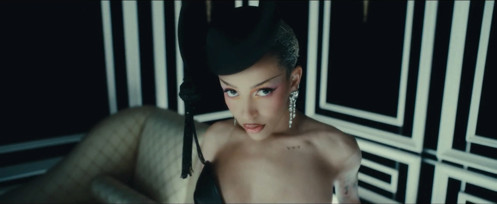 Still frame 9 from LISA - BORN AGAIN feat. Doja Cat & RAYE (2025) directed by Bardia Zeinali