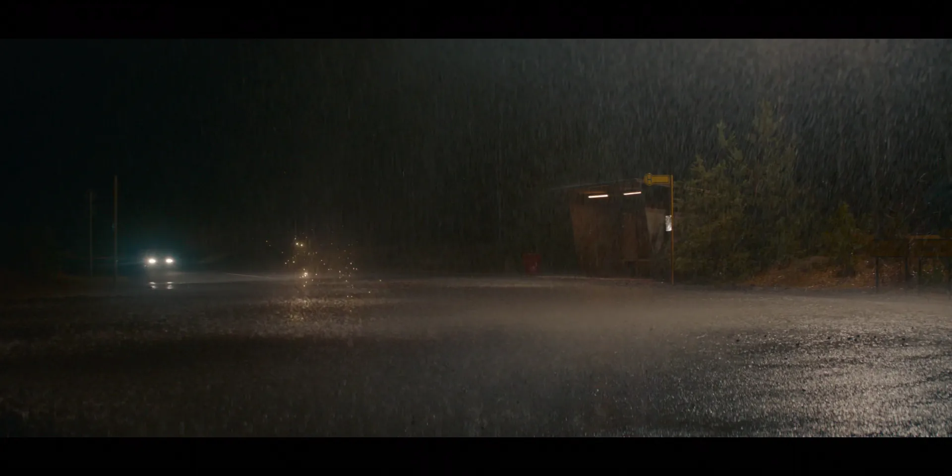 Heavy rain on a night exterior — the weather a call sheet should have flagged at breakfast, not sprung at 2 p.m. (Dark, 2017–2020)